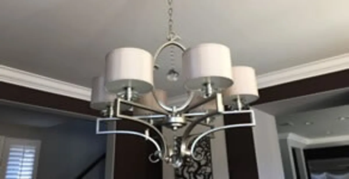 Modern chandelier installation with multiple light fixtures in Columbia, SC