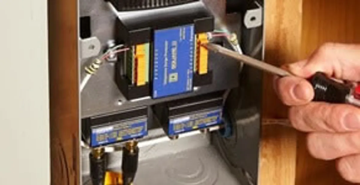 Whole home surge protection device being installed by a licensed electrician to protect electrical systems in Columbia, SC